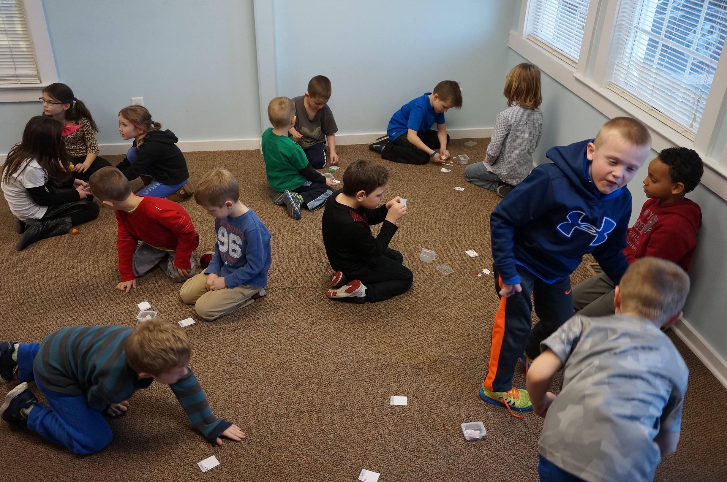 The player who rolls the highest number wins a sticker on his or her card.