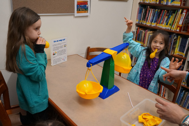 Air has mass. Balloons weigh more with air inside. Going down!