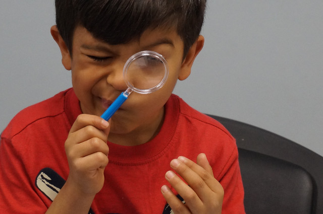 AWESOME! We found magnifiers in a bag in the back room.