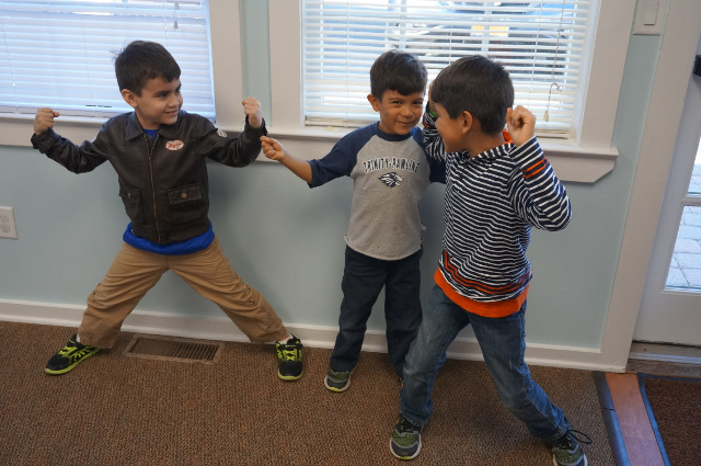 Hold a muscle monster pose for 20 seconds.