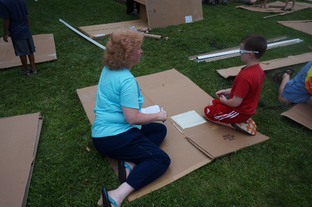 Families work together to create their own unique design.