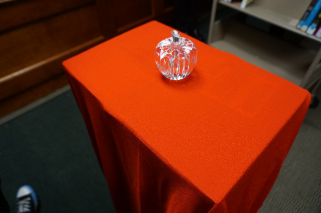 The apple awaits the visitors.