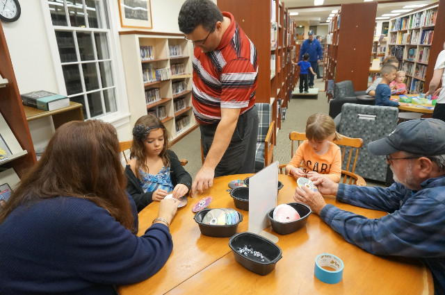 Did you know you can make a cool top using a CD, screw, nut and 2 washers?