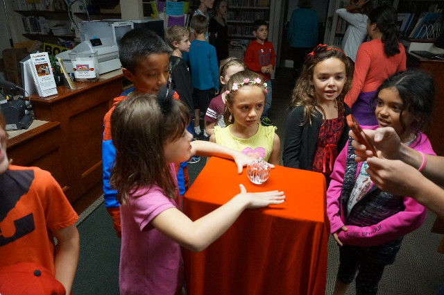 Our visitors are in awe of the beautiful apple!