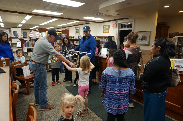 A pulley can make a 6 year old stronger than two grown ups!
