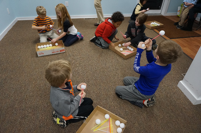 We use glow sticks and styrofoam balls.