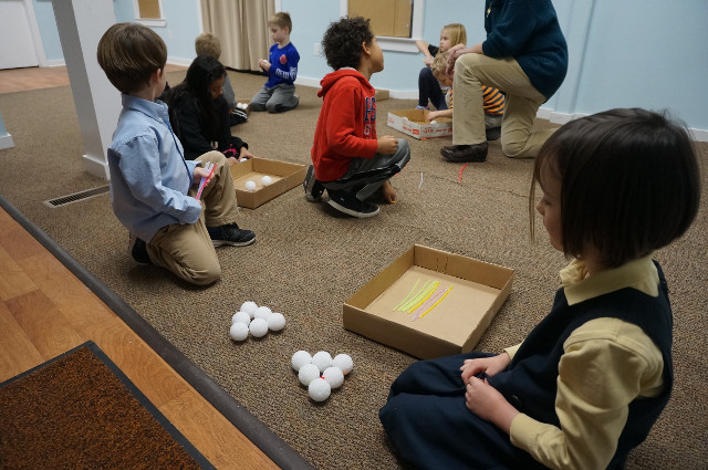 We try to build a tetrahedron with three balls on each edge.