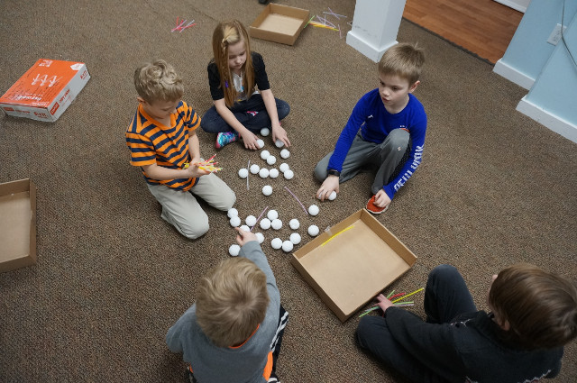 Here's a challenge...how about four balls on each edge?