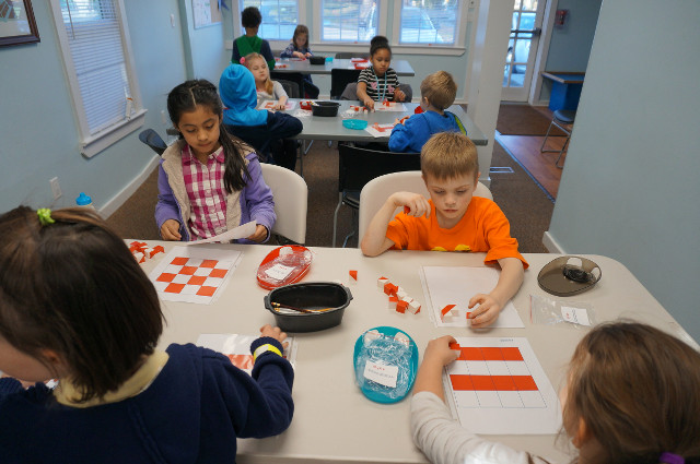 Then we try different puzzles on the tables.