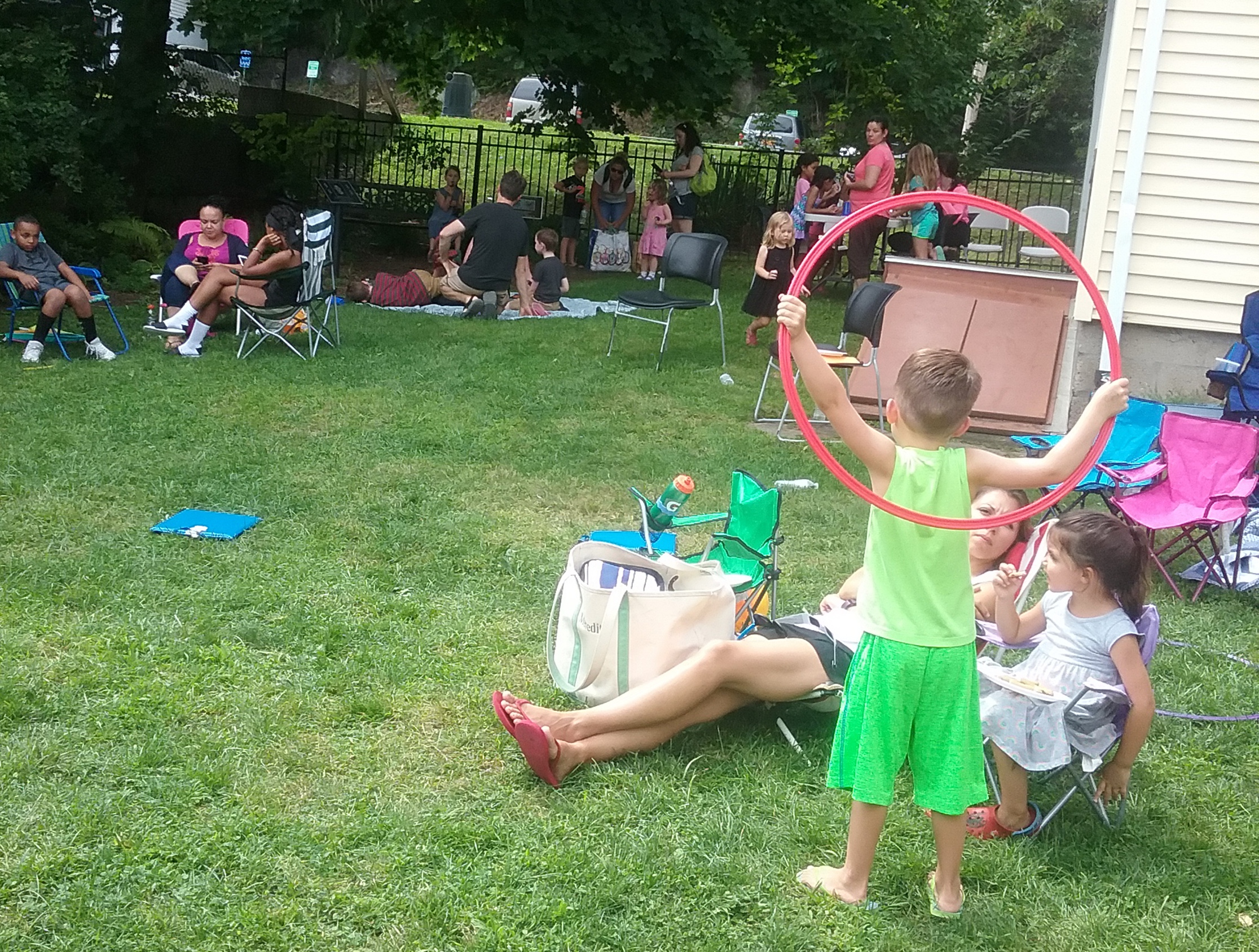 Families Enjoy the Sun While Waiting for the Solar Eclipse